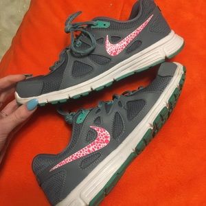 Size 7.4 Pink and Grey Cheetah Nike’s (like new!)